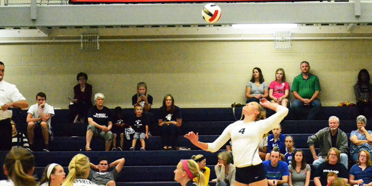 Senior-Hannah-Carey-jumps-to-kill-the-ball